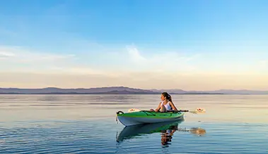 Person Kayaking on a body of water